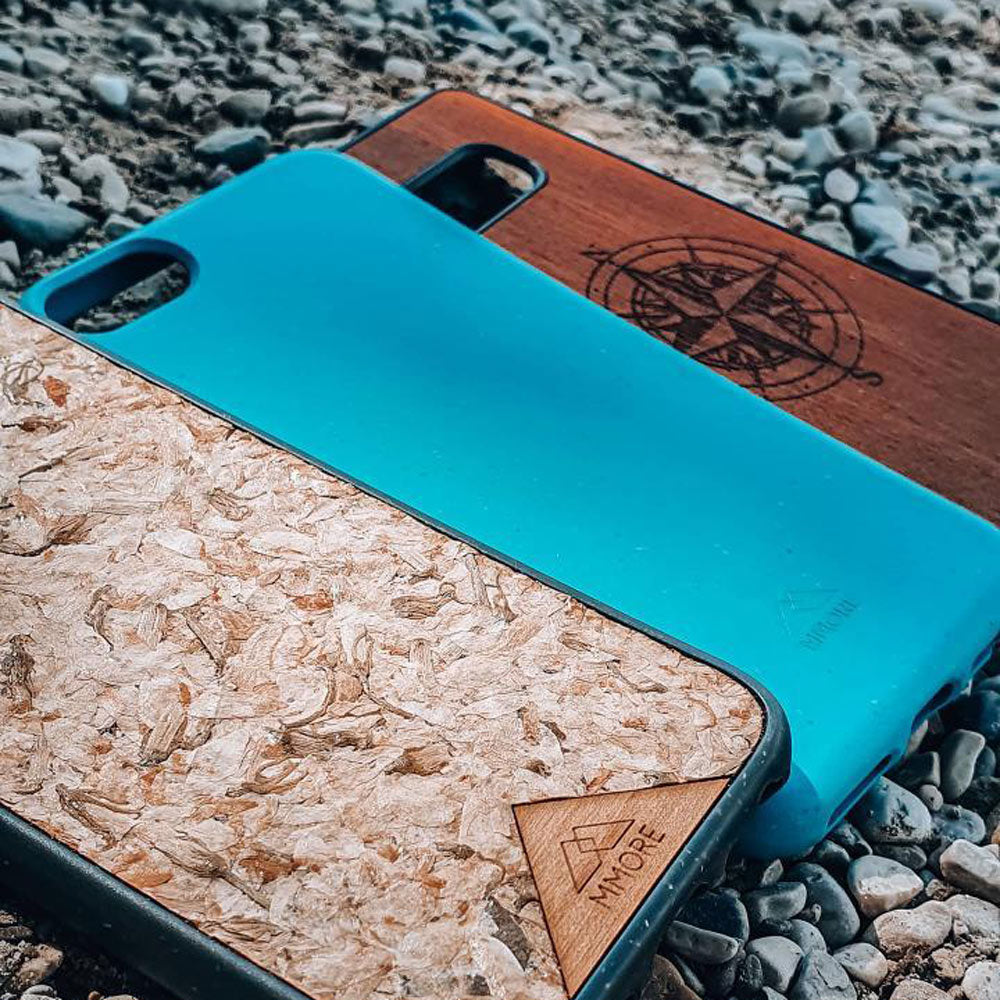 Biodegradable phone case between a wood and organic phone case