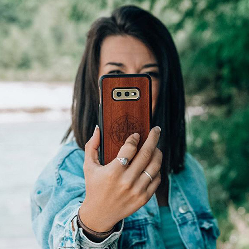 Wooden Phone Case Engraved Compass in Hands