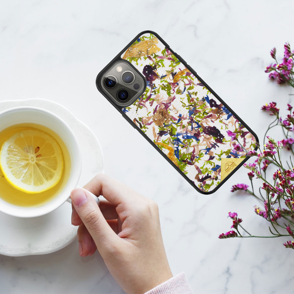 Flat Lay of Crystal Meadow Pohne Case with Tea
