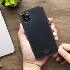 Transparent ocean plastic case held in hands