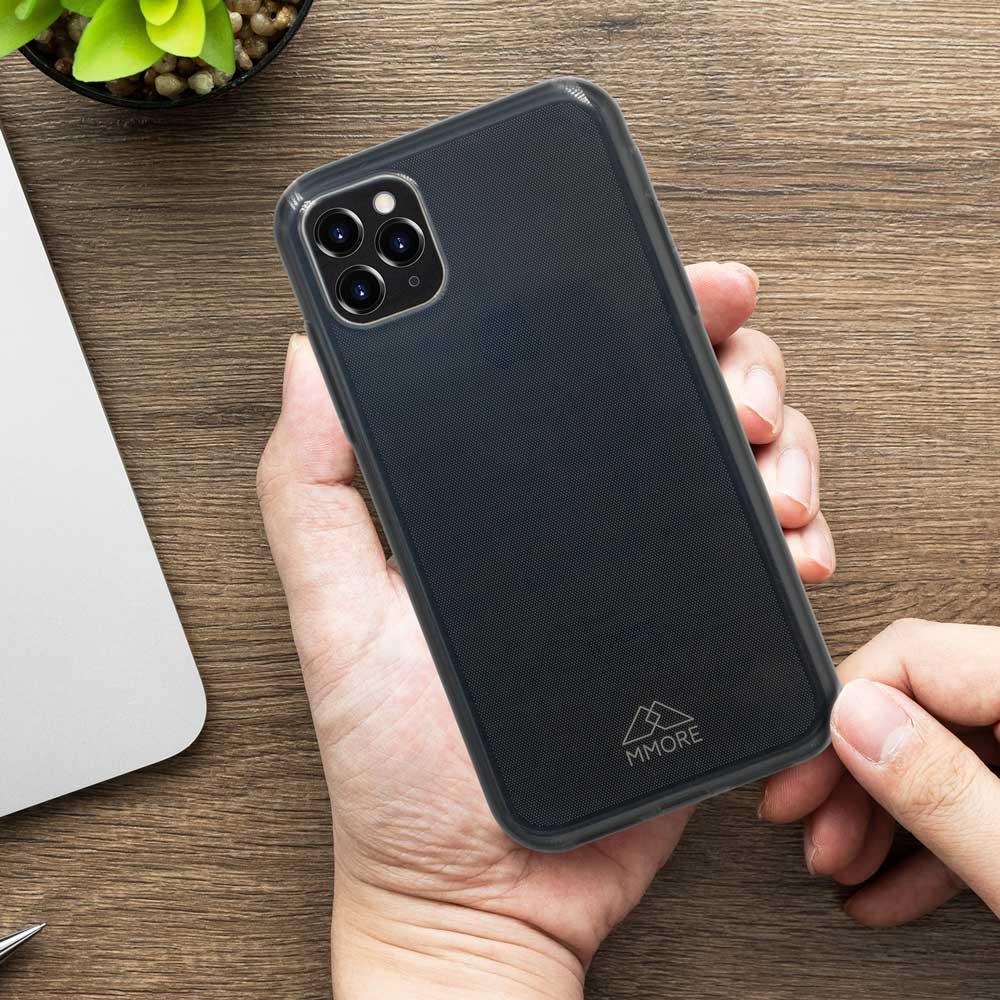 Transparent ocean plastic case held in hands