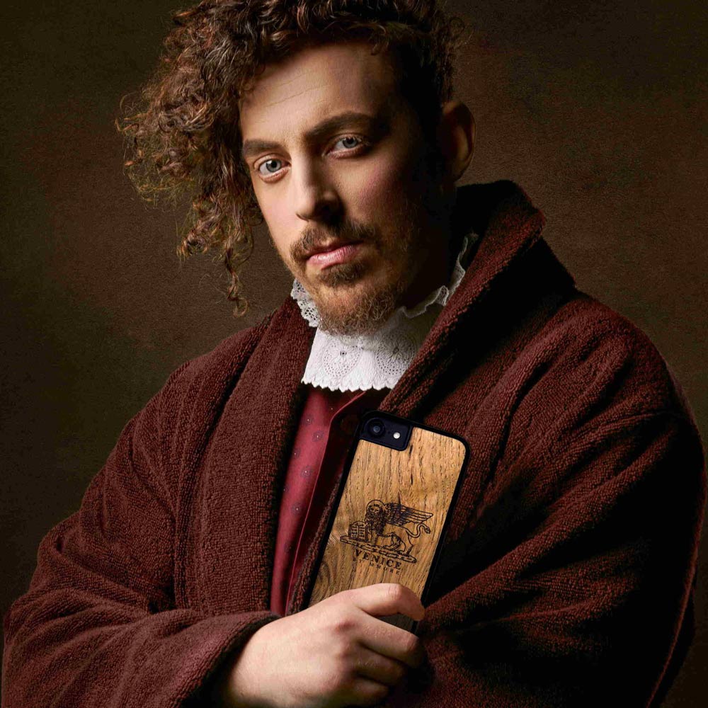 A man holding a Venice Lion Phone Case