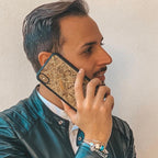 Man holding an Alpine Hay iPhone X