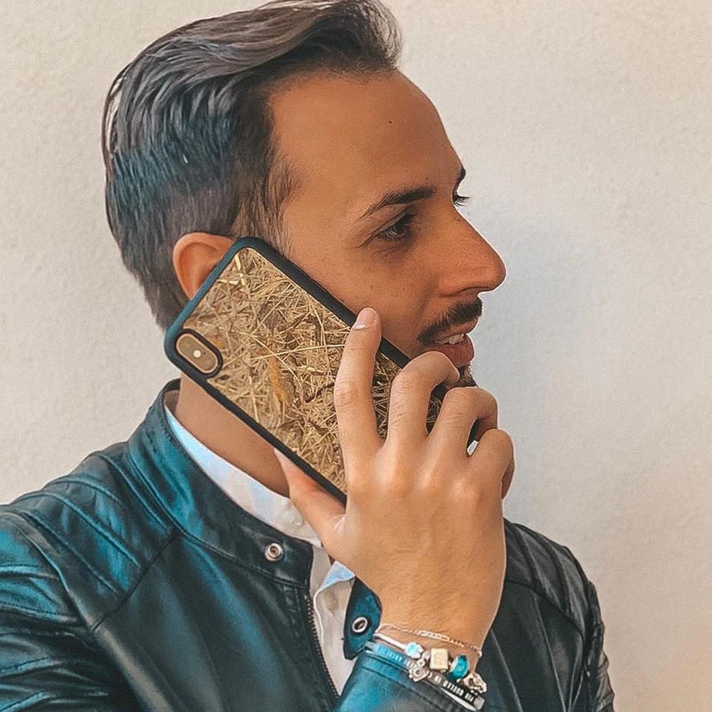 Man holding an Alpine Hay iPhone X